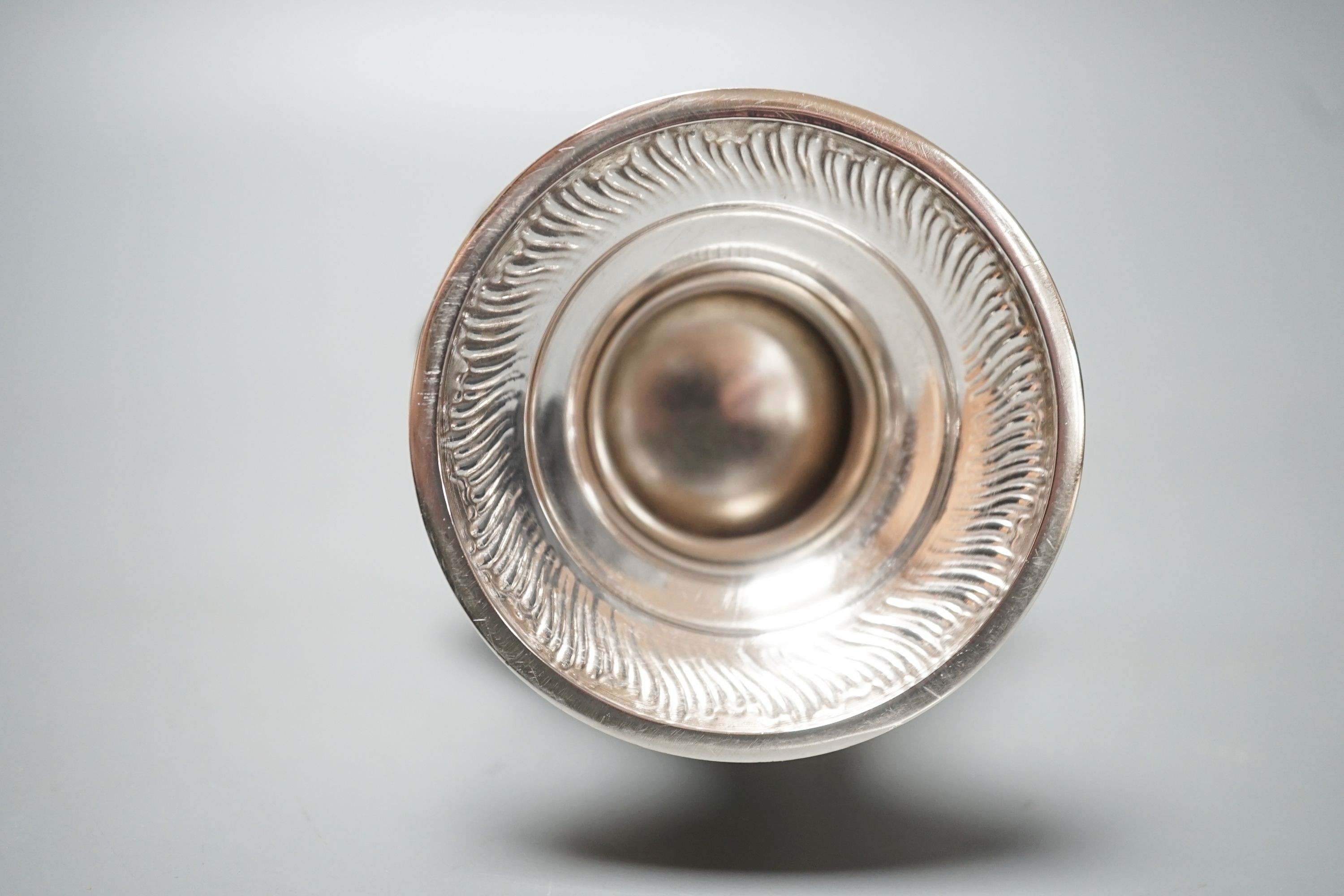 A large Victorian repousse silver sugar caster, London, 1887, 22.7cm, 8.5oz.
